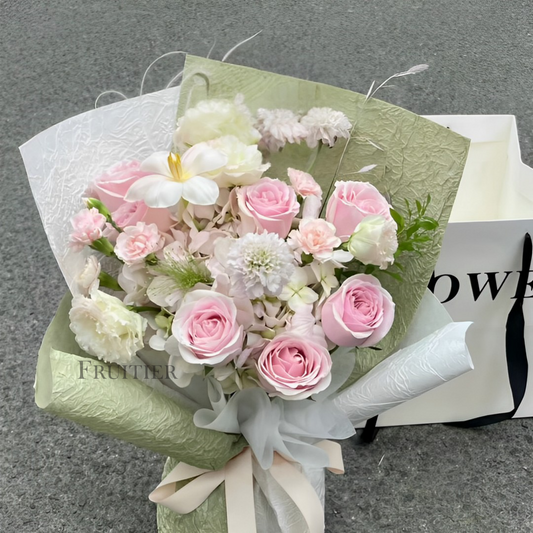 Pink roses mixed with hydrangeas, cream and green bouquet