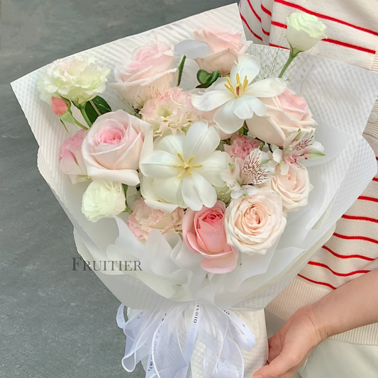 Light pink roses mixed with white Phalaenopsis bouquet