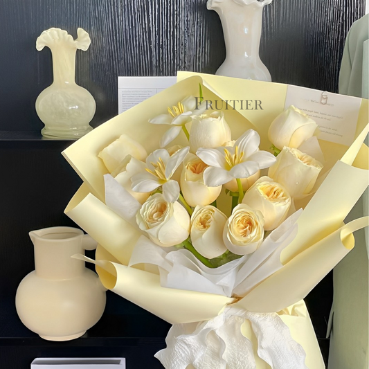 Light yellow champagne roses mixed with white phalaenopsis  bouquet