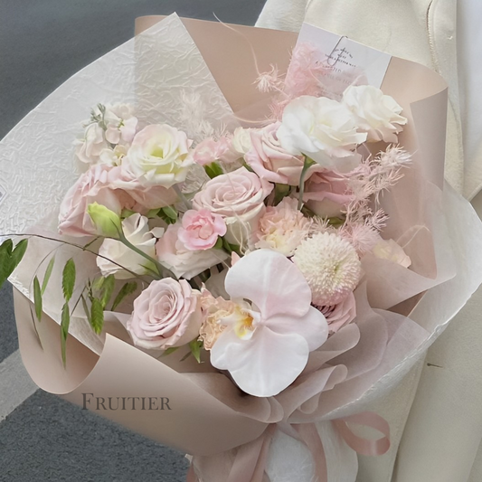 Light pink roses mixed with white Phalaenopsis bouquet