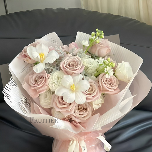 Pink roses mixed with white phalaenopsis bouquet