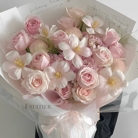 Light pink roses mixed with pink tulips bouquet